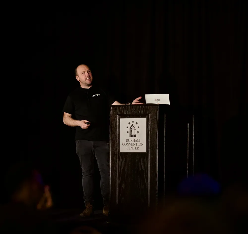 Jon on stage at Conj 2023